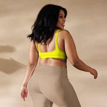 Rear view of woman wearing yellow bikini top