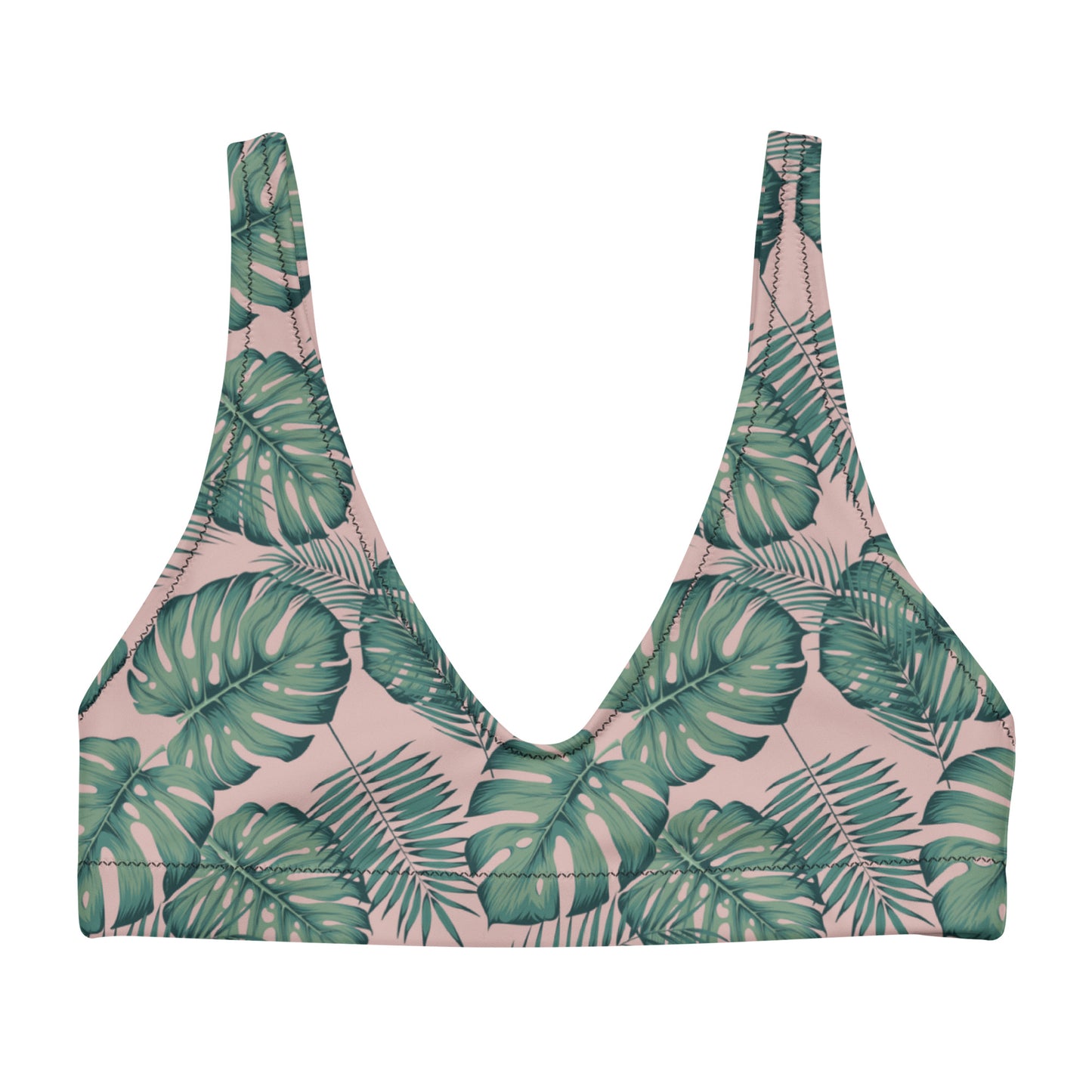 Bikini top with pattern of green palm leaves set on a pink background.