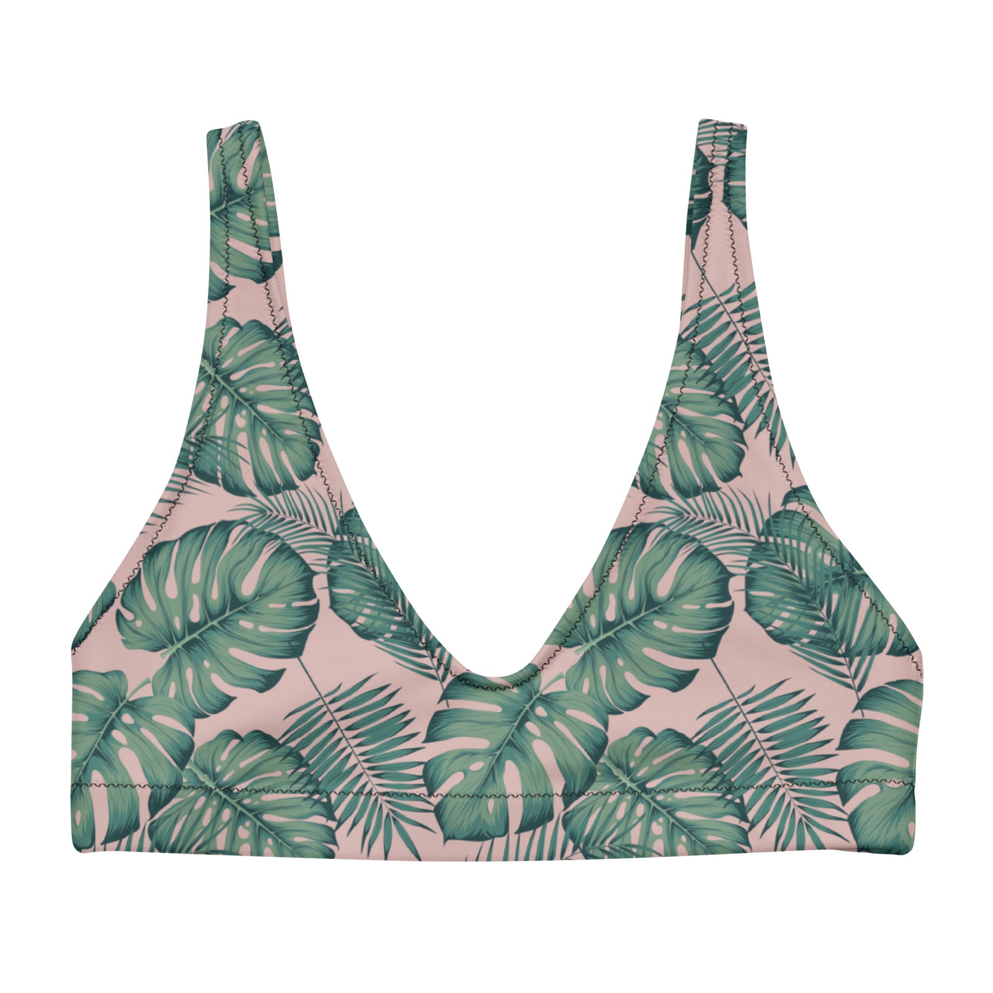 Bikini top with pattern of green palm leaves set on a pink background.