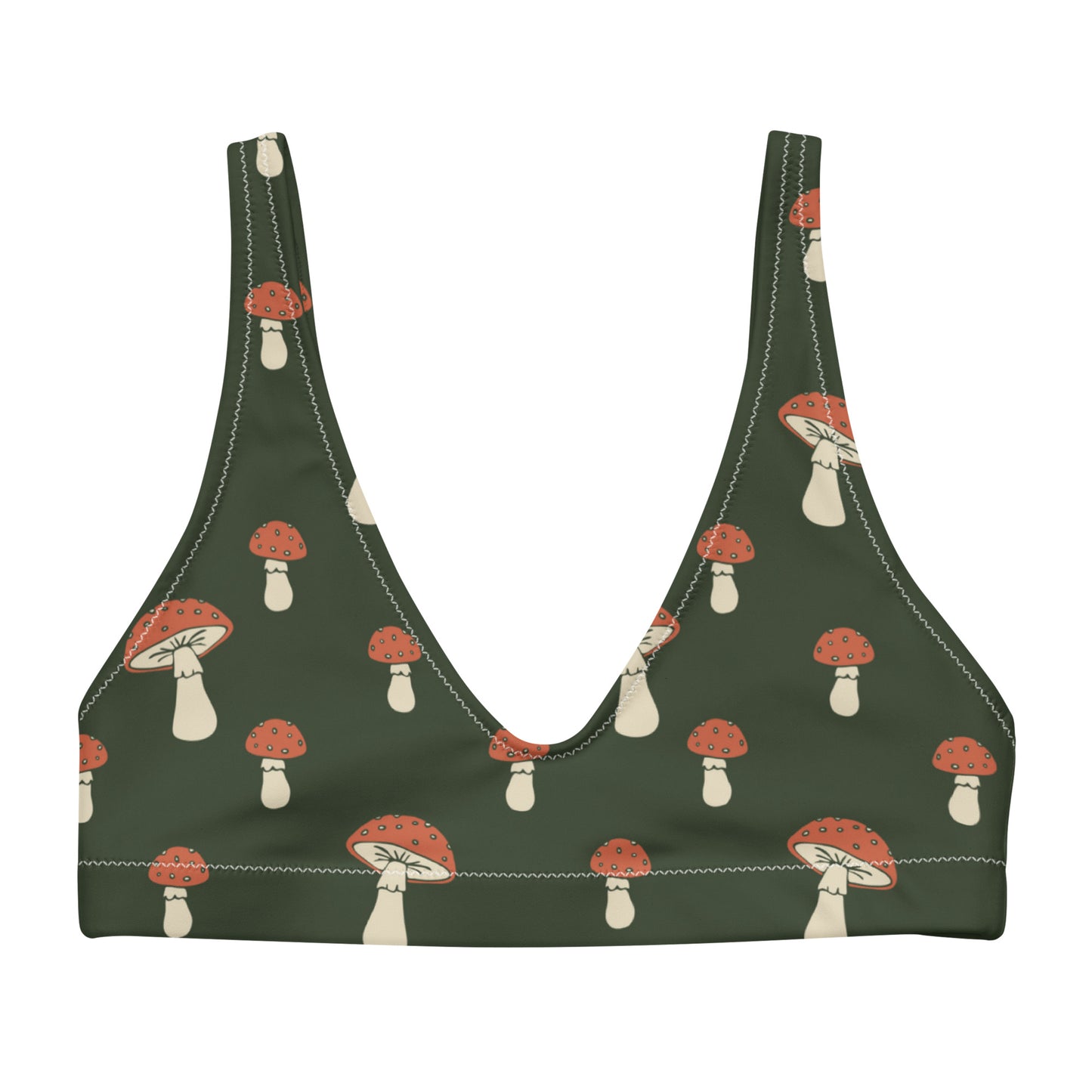 Bikini top with pattern of mushrooms set on a green background.