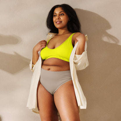 Woman wearing yellow bikini top