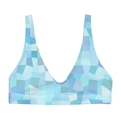 Bikini top with cyan geometric pattern.