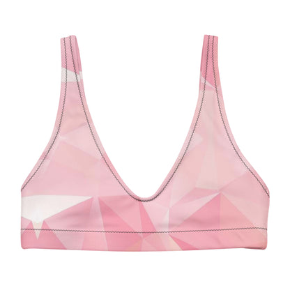 Bikini top with pink geometric pattern.