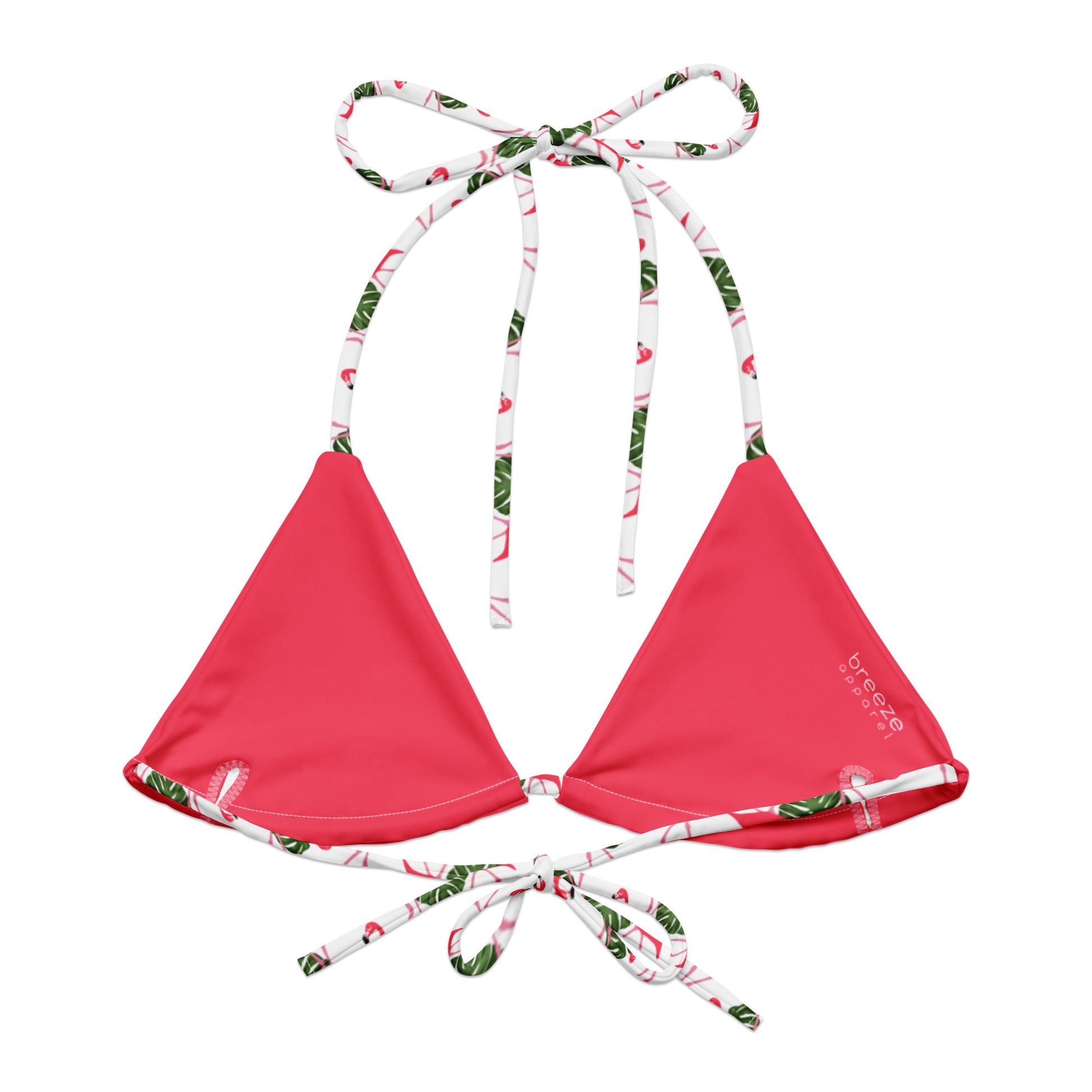 Back of bikini top with pattern of flamingos set on a white background. Interior is pink.