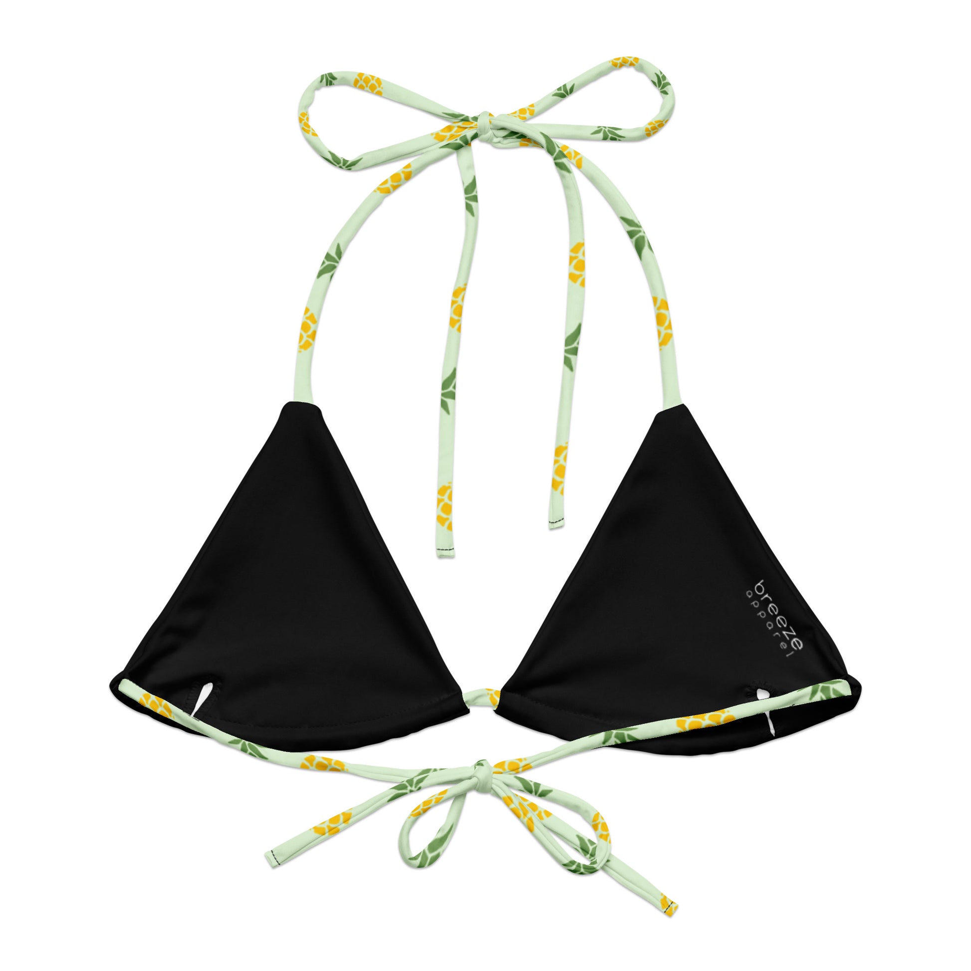 Back of light-green bikini top with all-over pineapple pattern. Interior is black.