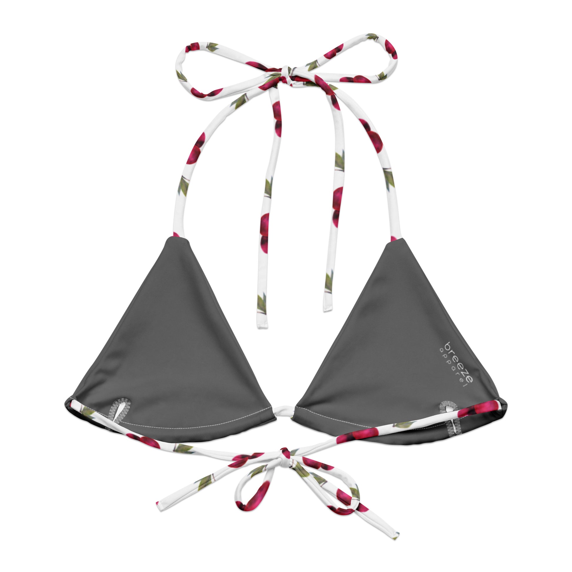 Back of bikini top with all-over pattern of cherries set on a white background.