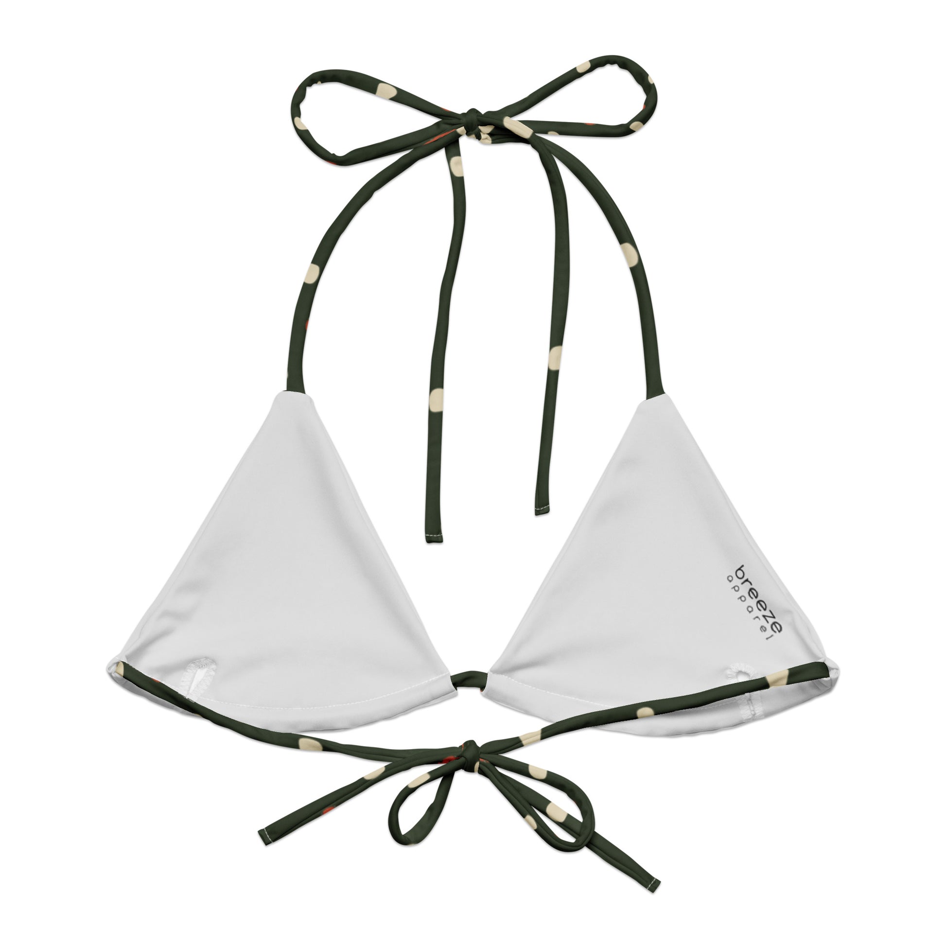 Back of bikini top with pattern of mushrooms set on a forest-green background. Interior is light gray.