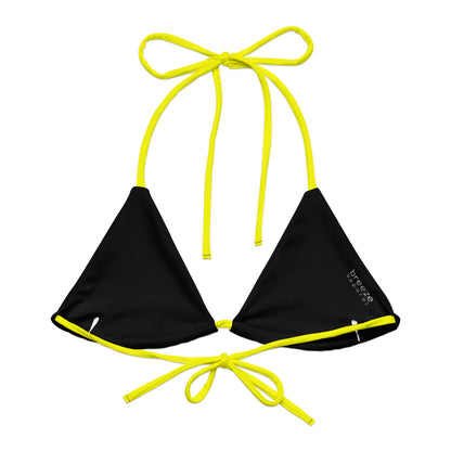 Back of yellow bikini top. Interior is black.