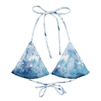 Bikini top with blue-white, watercolor-style design.
