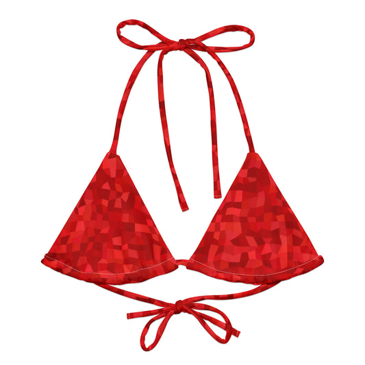 Bikini top with red geometric pattern. 