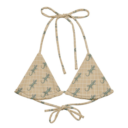 Beige bikini top with pattern of green geckos.