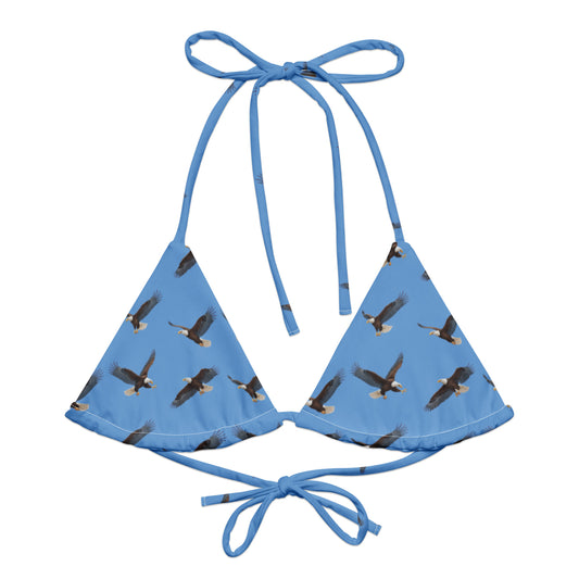Blue bikini top with pattern of bald eagles.