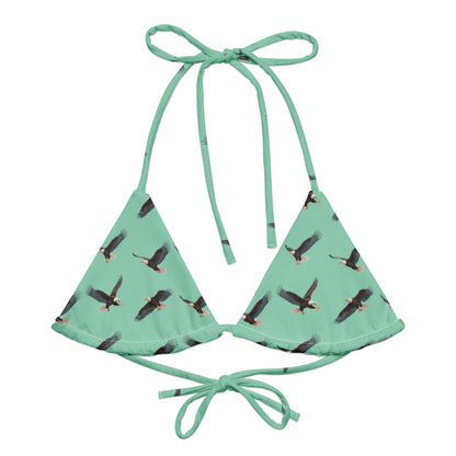 Green bikini top with pattern of bald eagles.