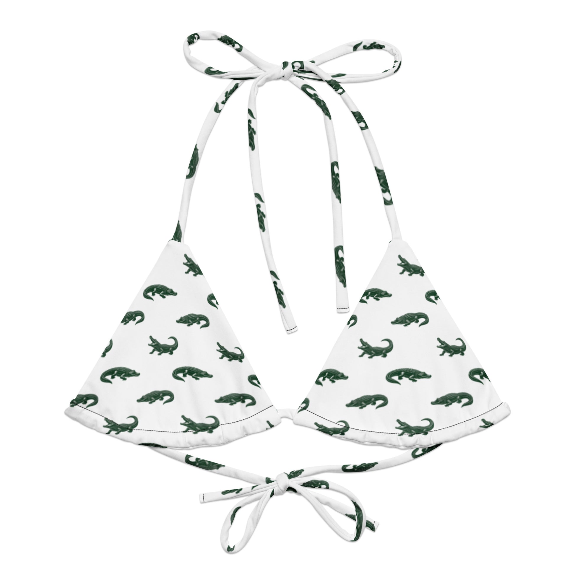 White bikini top with pattern of green alligators.