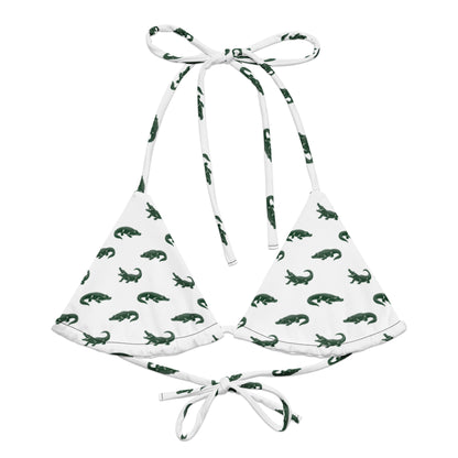 White bikini top with pattern of green alligators.