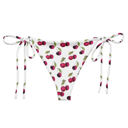 Back of bikini bottom with all-over pattern of cherries set on a white background.