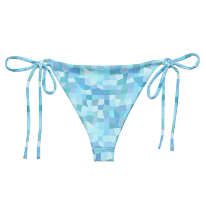 Back of bikini bottom with cyan geometric pattern.