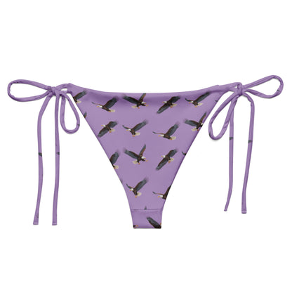 Purple bikini bottom with pattern of bald eagles.