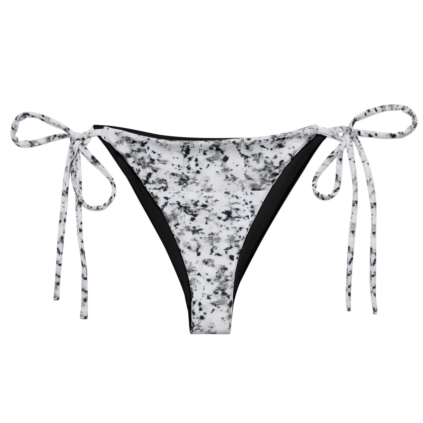 Bikini bottom with design of black splotches on a white background.