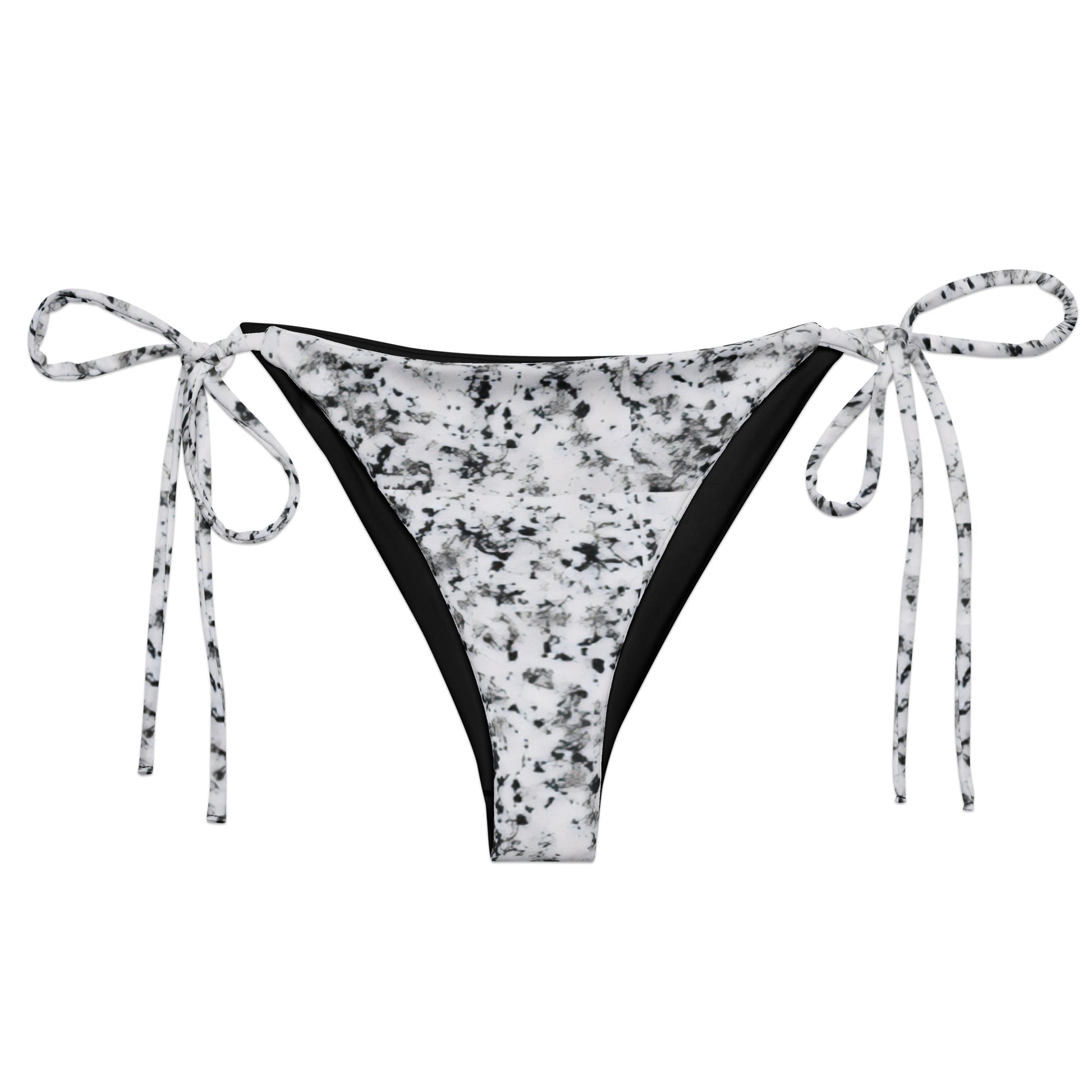 Bikini bottom with design of black splotches on a white background.
