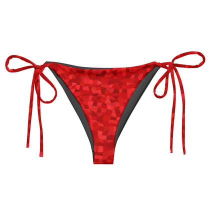 Bikini bottom with red geometric pattern.