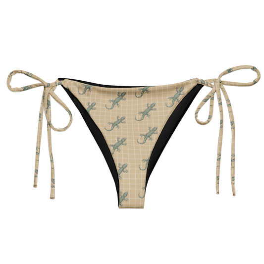 Beige bikini bottom with pattern of green geckos.