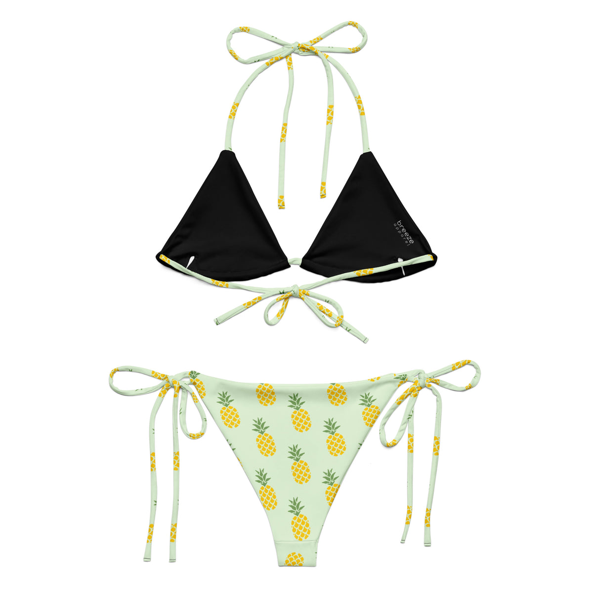 Back of light-green bikini with all-over pineapple pattern. Interior is black.