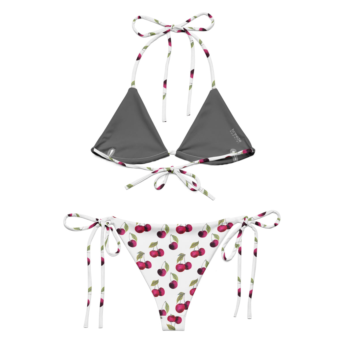 Back of bikini with all-over pattern of cherries set on a white background.