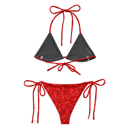 Back of bikini with red geometric pattern. Interior is dark gray.