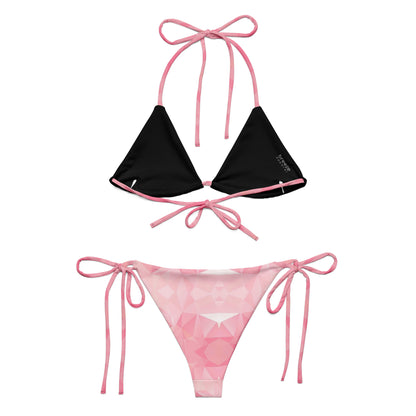 Back of bikini with pink geometric pattern. Interior is black.