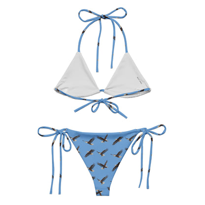 Blue bikini with pattern of bald eagles.