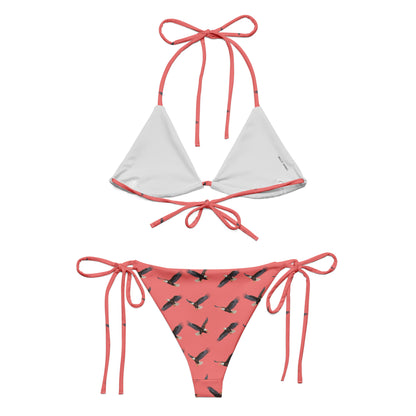 Red bikini with pattern of bald eagles.