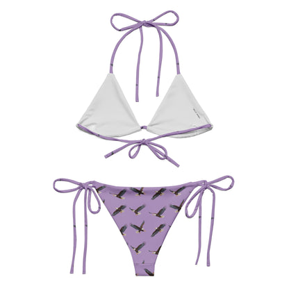 Purple bikini with pattern of bald eagles.