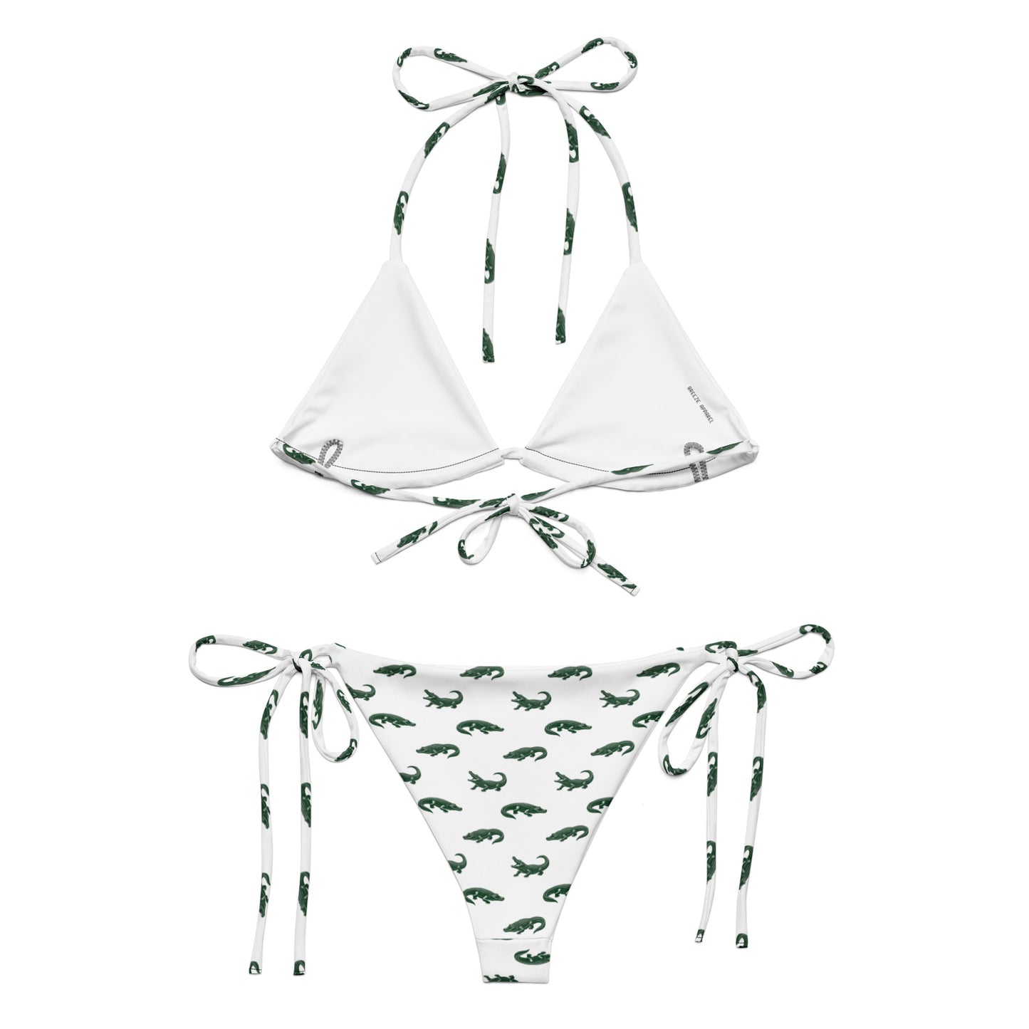White bikini with pattern of green alligators.