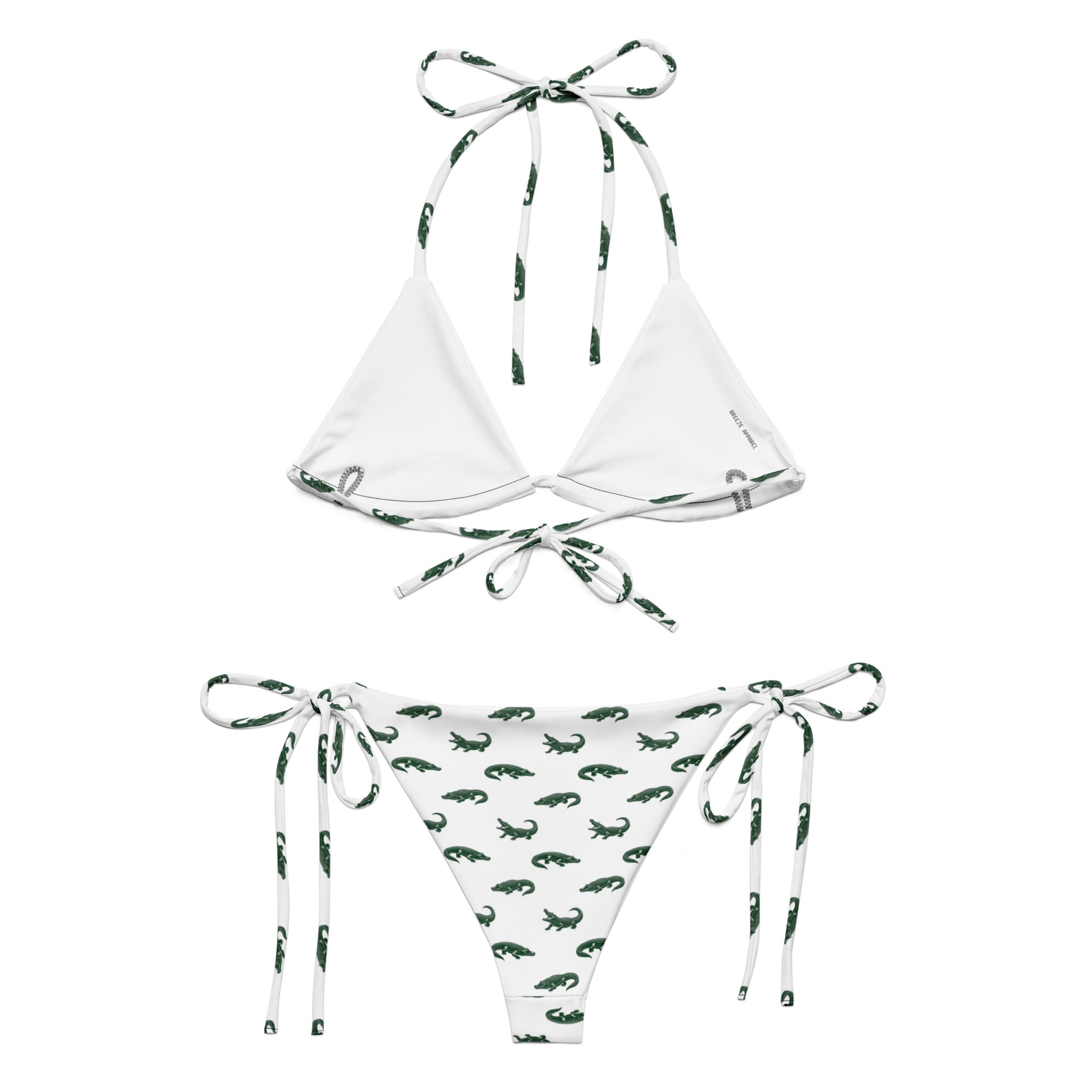 White bikini with pattern of green alligators.