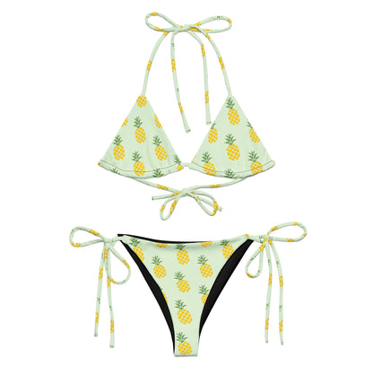 Light-green bikini with all-over pineapple pattern.