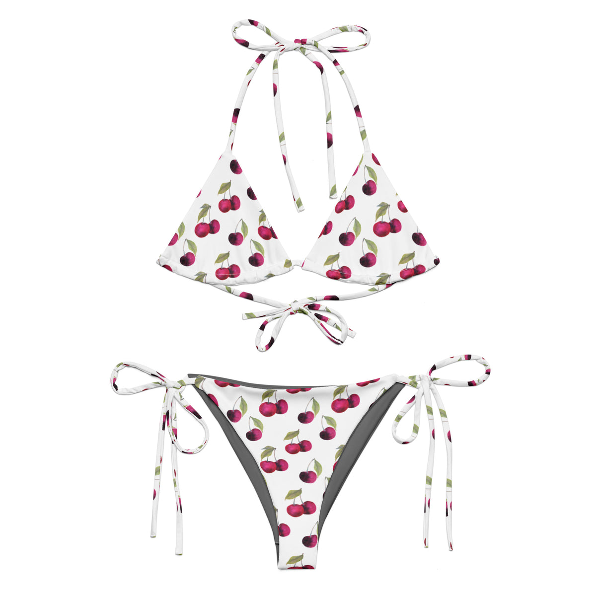 Bikini with all-over pattern of cherries set on a white background.