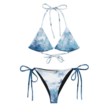 Bikini with blue-white, watercolor-style design.