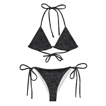 Bikini with dark-gray geometric pattern.