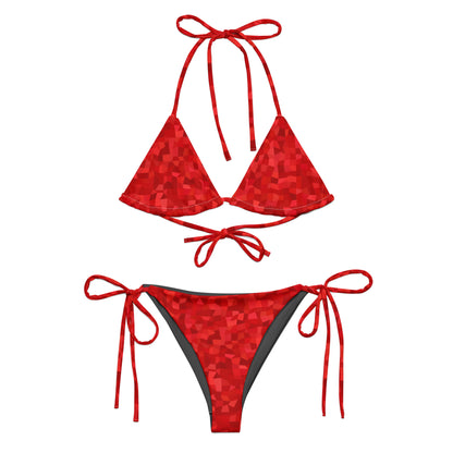 Bikini with red geometric pattern.