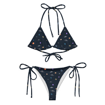 Bikini with pattern of UFOs and planets in space.