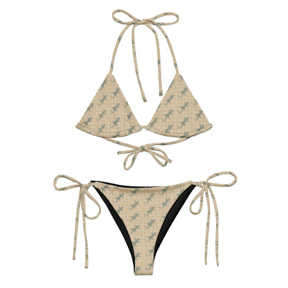 Beige bikini with pattern of green lizards.