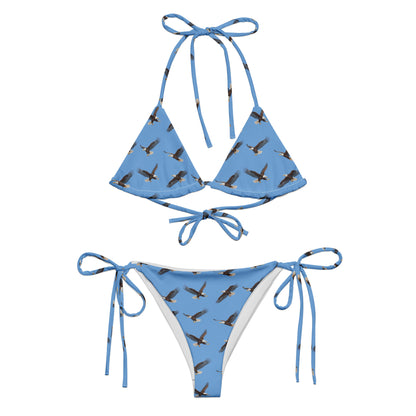 Blue bikini with pattern of bald eagles.