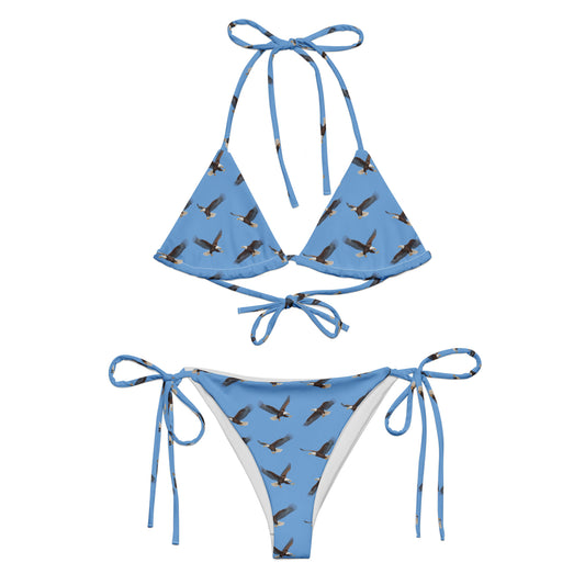 Blue bikini with pattern of bald eagles.
