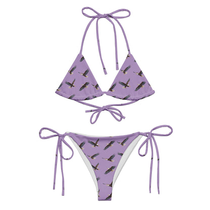 Purple bikini with pattern of bald eagles.