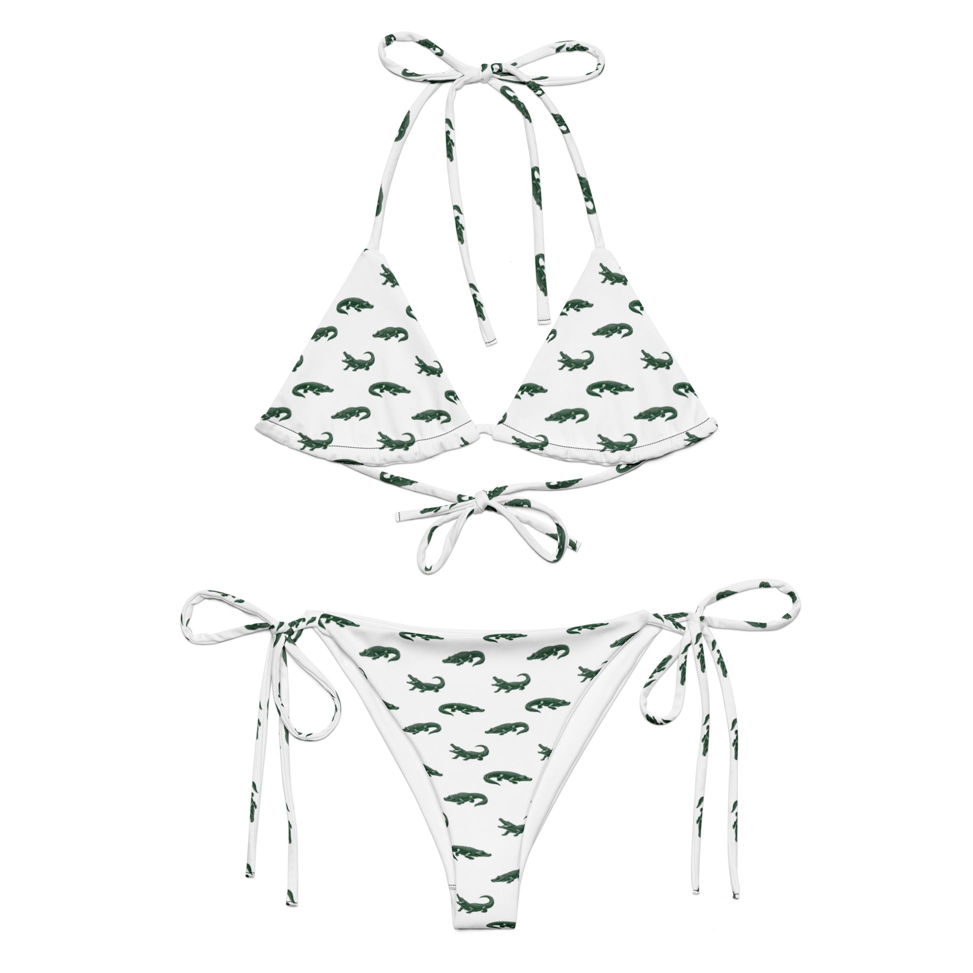 White bikini with pattern of green alligators.