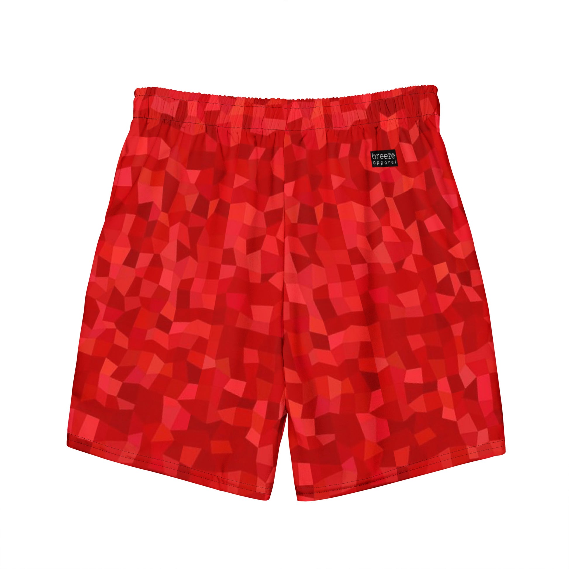 Swim trunks with red geometric pattern.