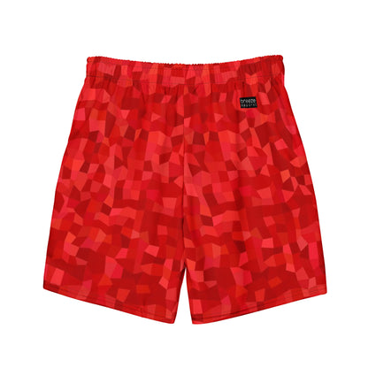 Swim trunks with red geometric pattern.