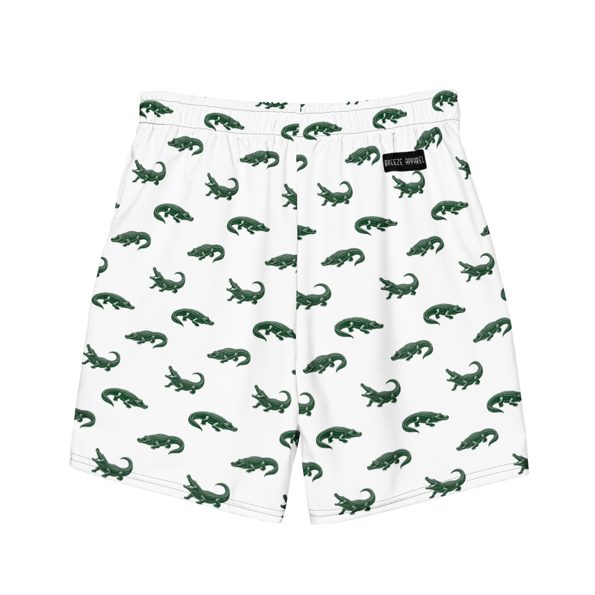 White swim trunks with pattern of green alligators.