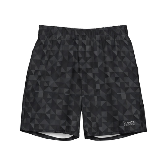 Swim trunks with black geometric pattern.